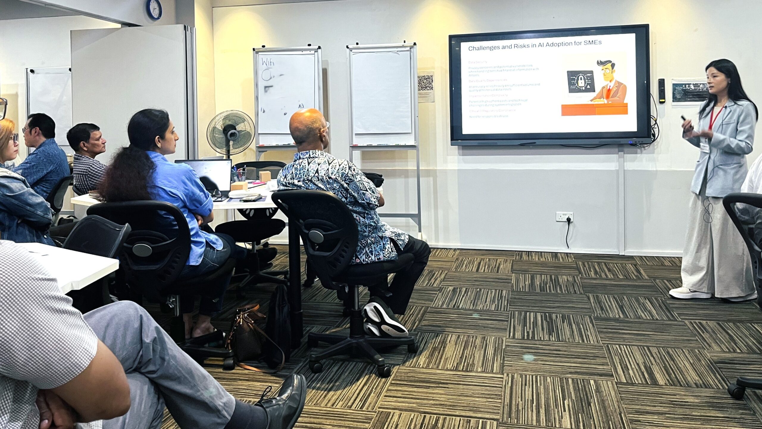 SME Centre@SICCI's business advisor addressing the crowd.