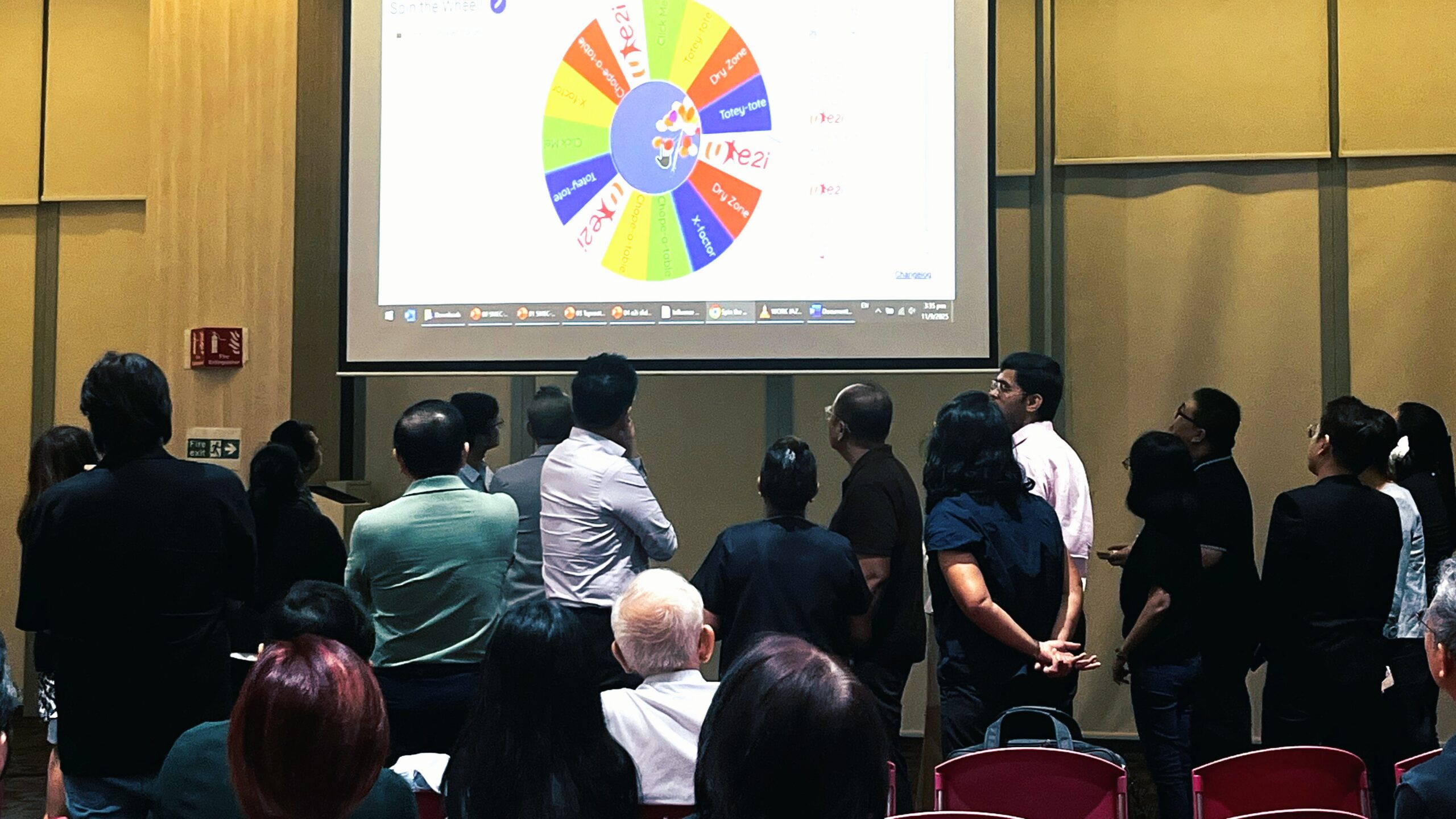 The crowd playing a game on 11 September's workshop.